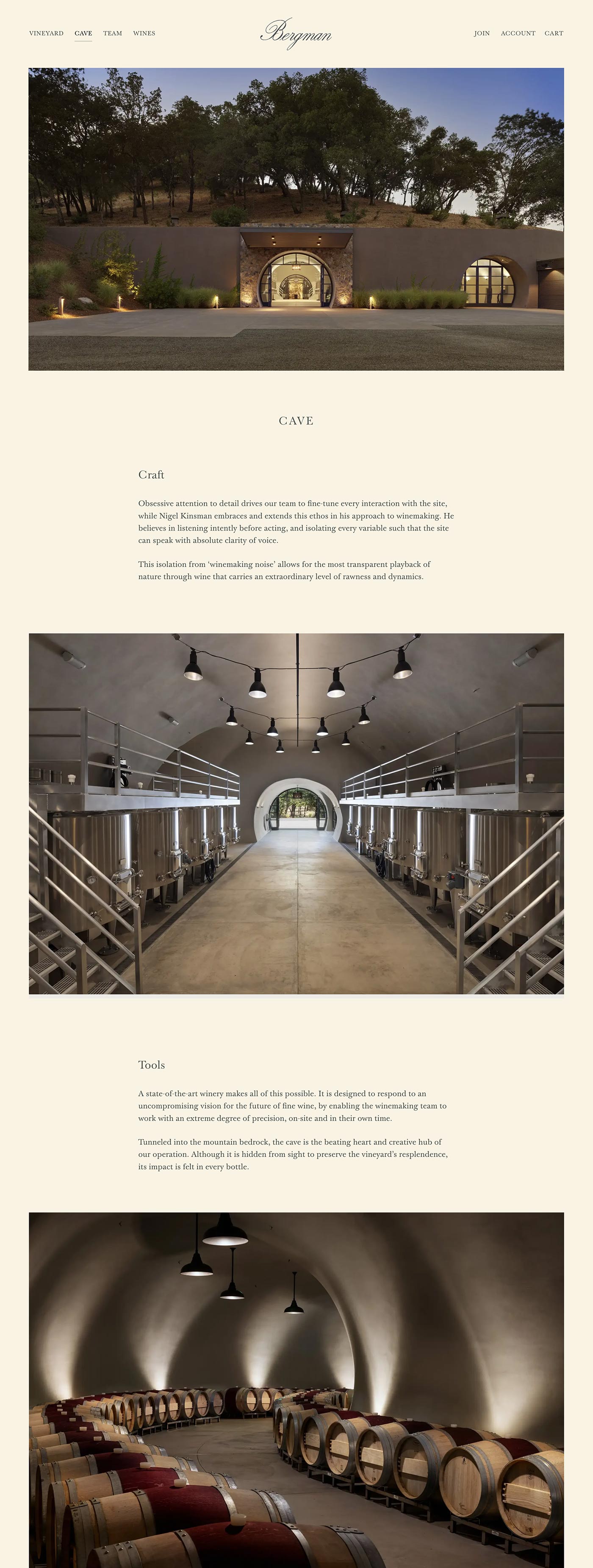 Winery cave entrance with wooden door; inside, metal fermentation tanks line a well-lit corridor. Below, barrels are stored in an underground room with arched ceilings and hanging lights.